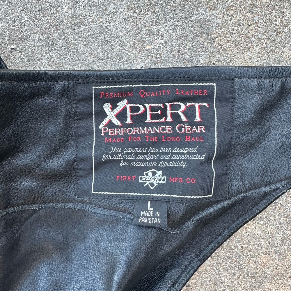 2 pair of leather chaps.